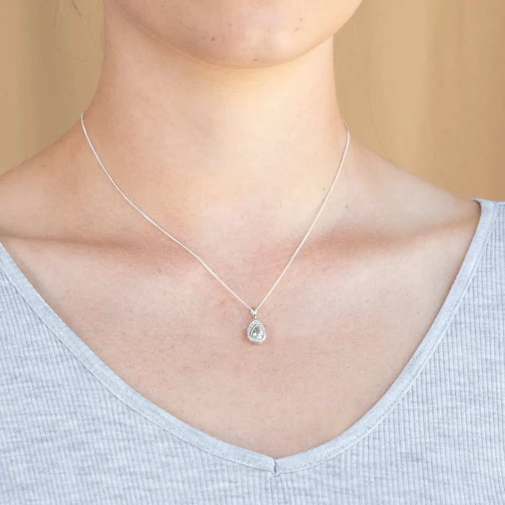 9ct White Gold Aquamarine   7 Diamond Pendant